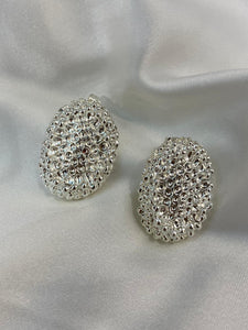Maxi aretes pegados